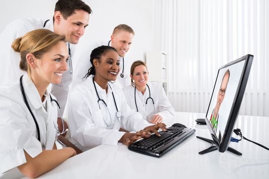 group of doctors video conferencing 